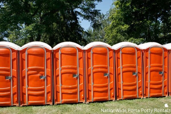 a lineup of clean and well-maintained portable loos for workers in Marcus Hook, PA