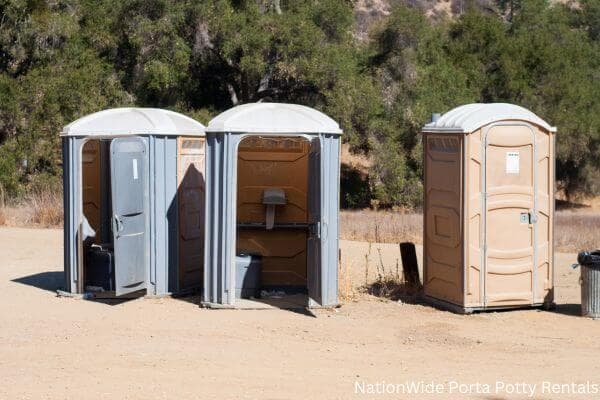 a clean row of portable restrooms for outdoor weddings or festivals in Perryopolis, PA